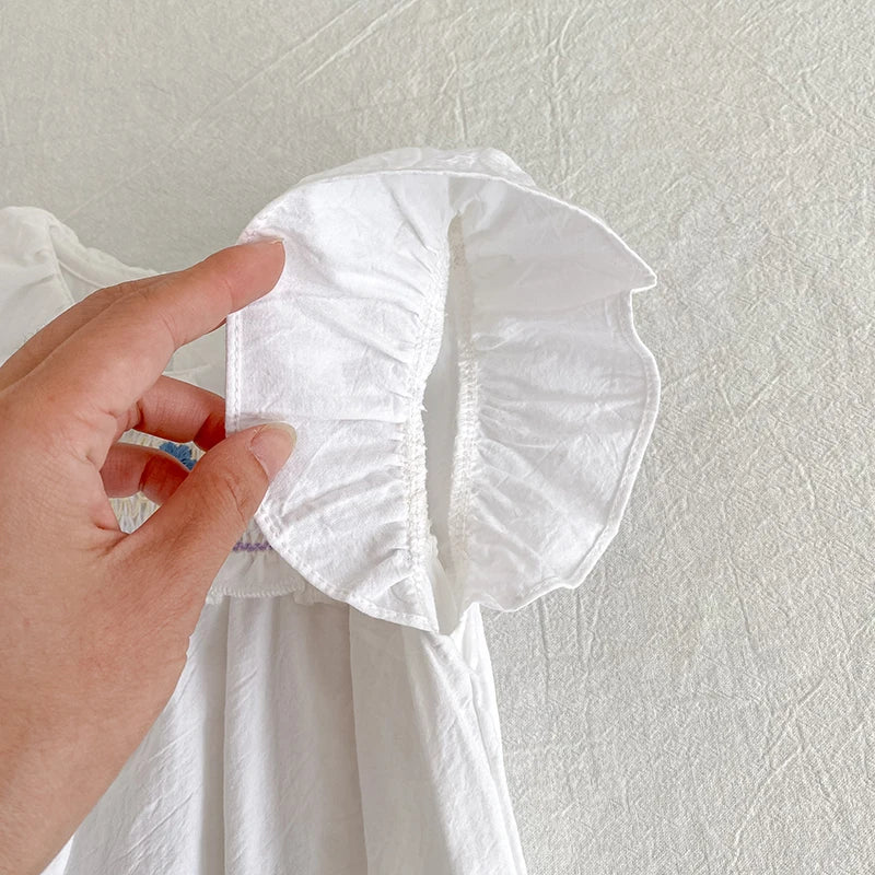 Goo & Co. Daisy Smocked Romper