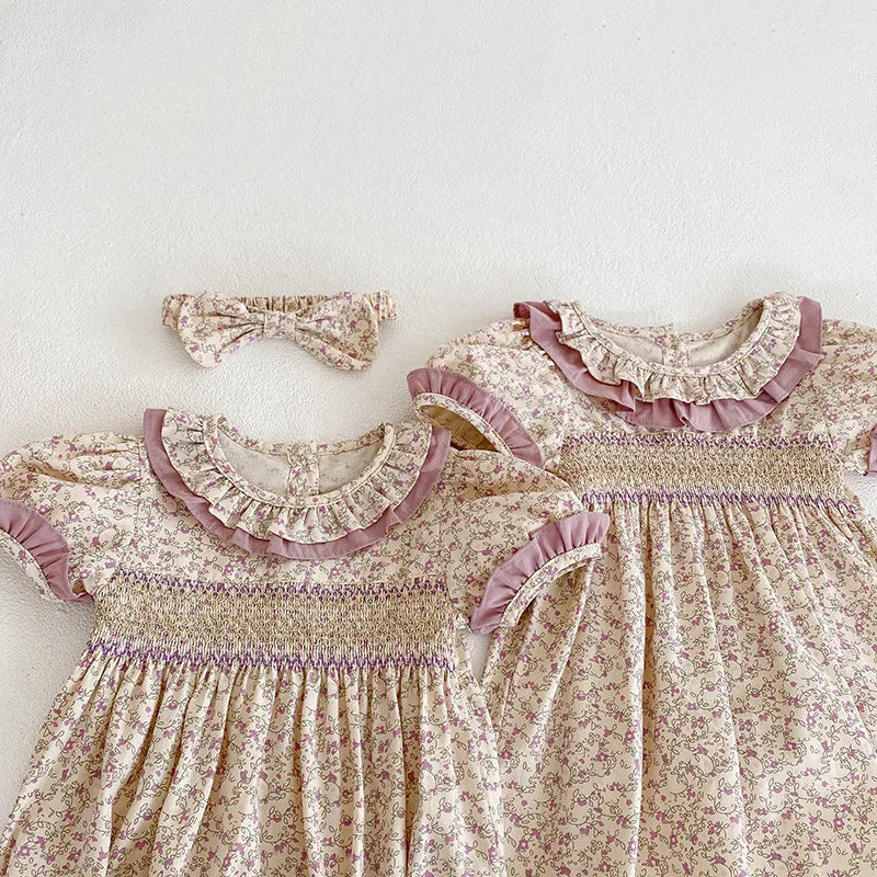 Goo & Co. Poppy Vintage Floral Smocked Romper