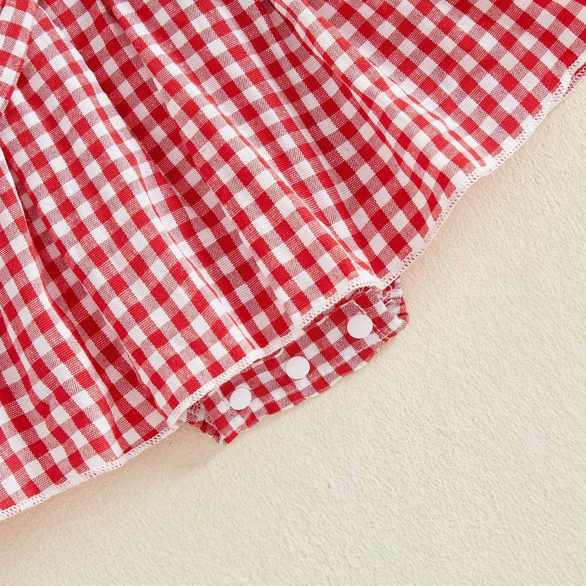 Ruby Gingham Skirted Romper