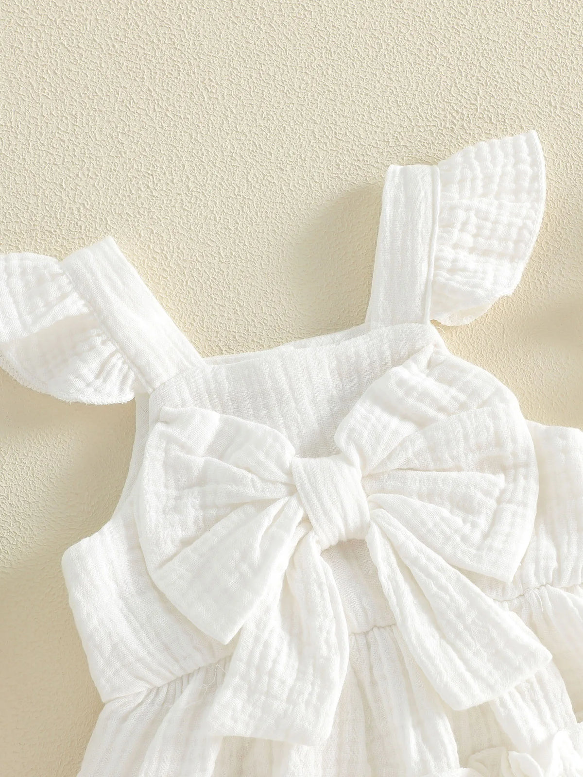 Nevah Bow & Flutter Romper - Peach